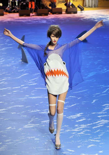 Alexander McQueen: A model wears a shark dress by Jean-Charles de Castelbajac