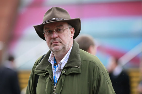 Tory conference fashion: Delegates shelter from the rain
