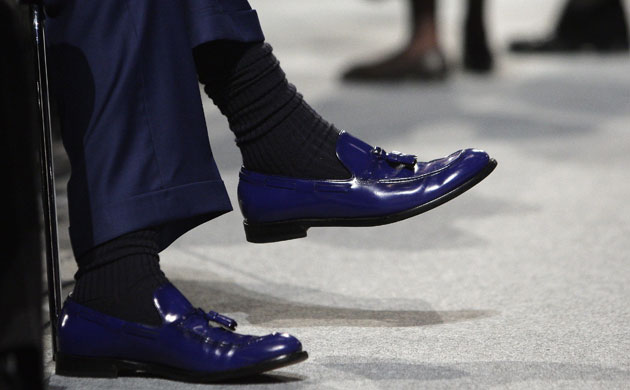 Tory conference fashion: A man taps his blue loafers