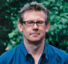 Nigel Slater holding a tray of vegetables