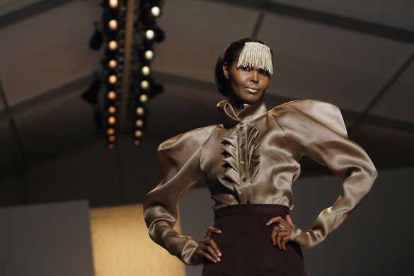 NY fashion week: Thursday: A model wears Christian Siriano and a golden fringe