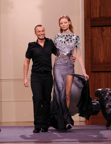 LFW: Monday's shows: Julien Macdonald and model take to the catwalk
