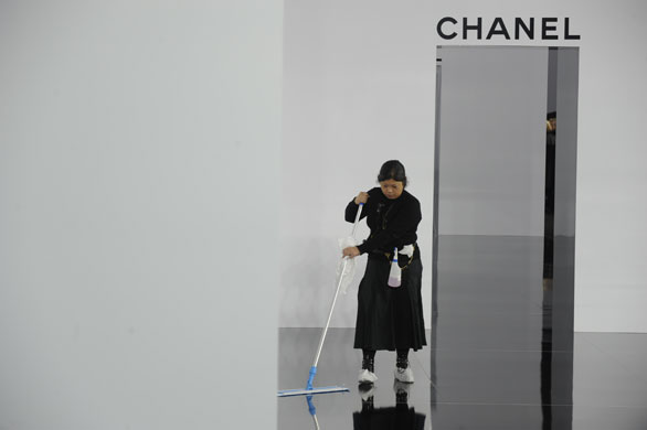 Paris FW: Tuesdays shows: A cleaner prepares for the Chanel show 