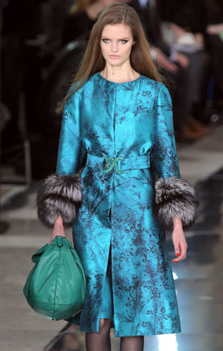 Paris FW: Tuesdays shows: A model wears Valentino