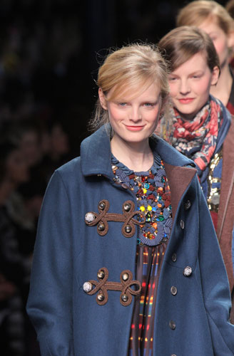 Paris FW: Wednesday: A model wears a coat by Kenzo