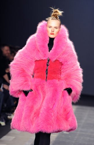 MFW: weekend roundup: A model wears a coat from Iceberg