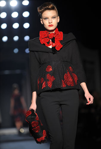 MFW: weekend roundup: Poppies adron this model's dress by Moschino