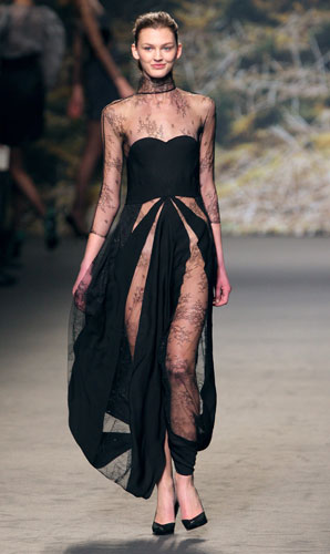 Strike a pose: A model smiling.