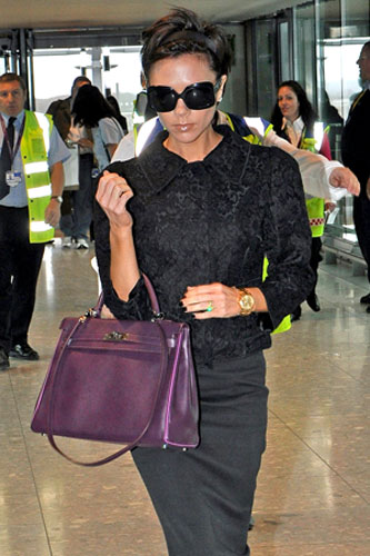 Victoria Beckham's bags: Victoria Beckham leaving Heathrow airport for Los Angeles