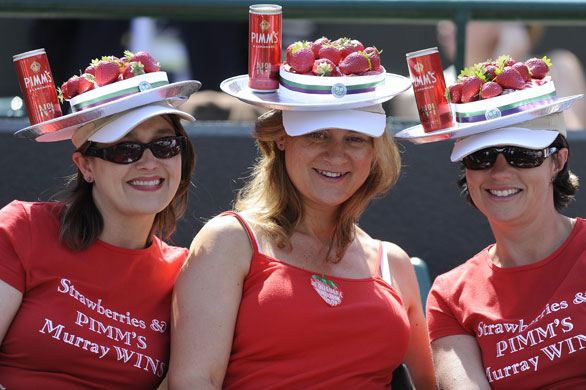 Wimbledon fashion: Fans wearing strawberries and Pimms hats