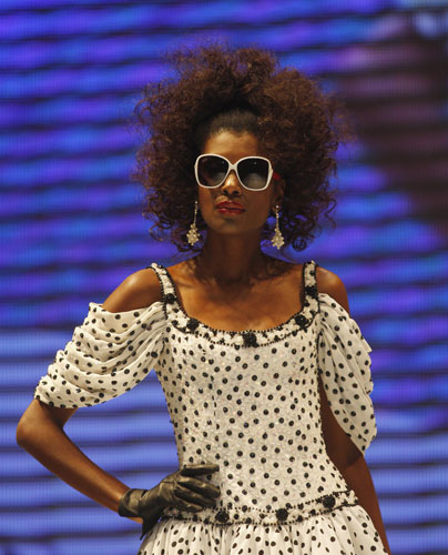 Fashion round-up: A model wears a dress made by Argentine designer Roberto Piazza