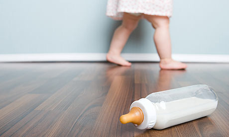 Baby girl and a bottle