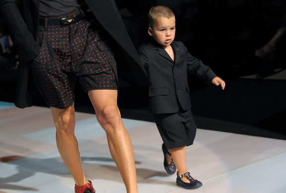 Menswear gallery: A model and a child wear Emporio Armani