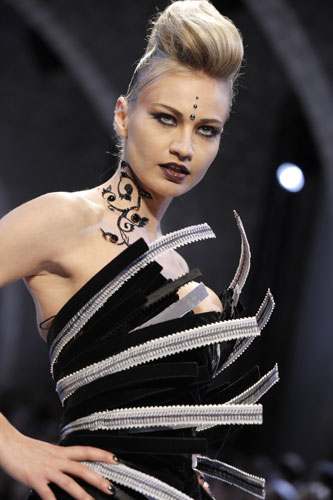 Haute couture: A model wears a dress by Francois Eymeric