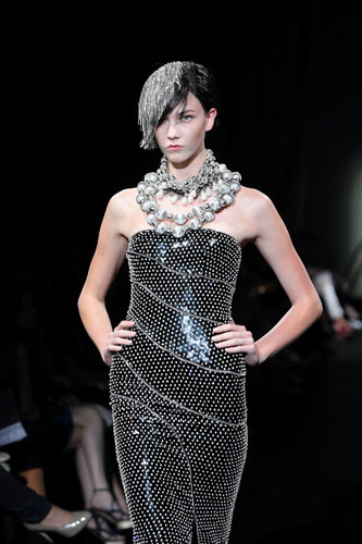 Haute couture: A model wears an outfit by Giorgio Armani