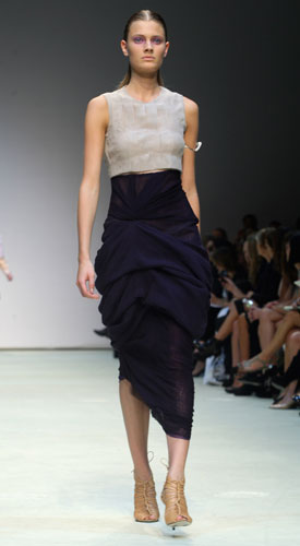 Monday LFW: A model wears Marios Schwab