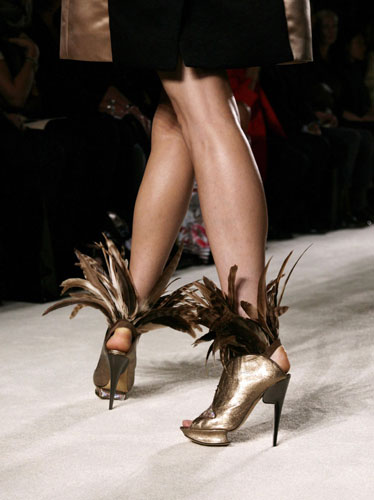 Tuesday at LFW: A model wears feathered shoes by Roksanda Ilincic 