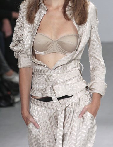 Paris fashion week: A model wears Tim Van Steenberg