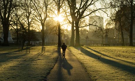 A man walks through Green Park