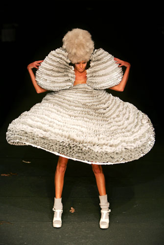 Fashion Decade: A model poses on the catwalk wearing Michiko Koshino