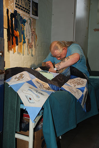 Fine Cell Work gallery: Prisoner embroidering for FCW