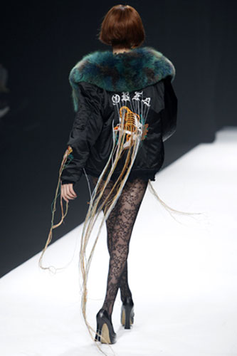Fashion shows: Cabaret Aki and Jackal Kuzu show at Japan Fashion Week in Tokyo