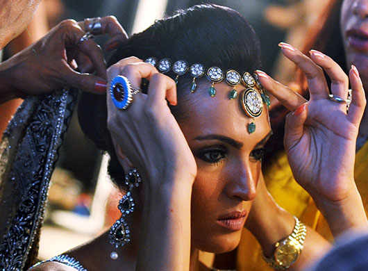 Fashion shows: Stylists prepare a Pakistani model backstage during Karachi Fashion Week
