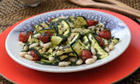Summer salads: Grilled courgette, tomato and bean salad with basil dressing recipe