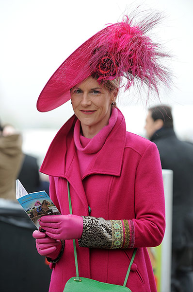 Cheltenham ladies day: A lady wearing pink at Cheltenham Festival