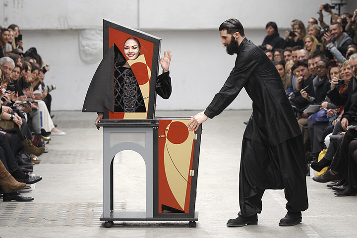 Paris FW Thursday shows: A magician performs with a model at the Manish Arora show