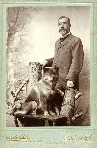 Vintage dogs: A man with his chow