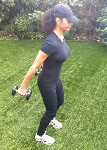 Efua Baker demonstrates the second stage of a tricep extension