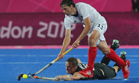 Turf war … Germany play New Zealand in the men's hockey at the London 2012 Olympics.