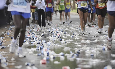 Water bottles on the ground during a marathon