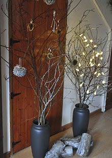 Vases full of spray-painted branches