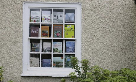 Gardening books on display in the window of a bookshop in Hay-On-Wye