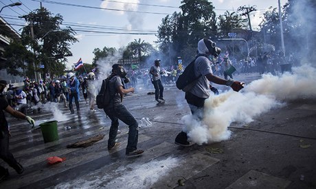Riot police fire tear gas at protesters in Bangkok, Thailand