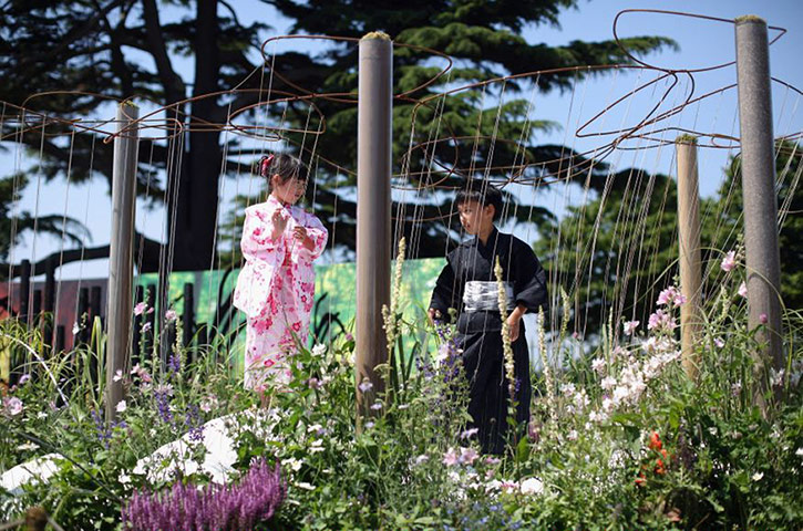 Hampton Court 2013: Japanese children in the Spirit of the Land garden at Hampton Court 2013