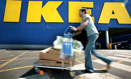 Shopper pushes a trolley at Ikea