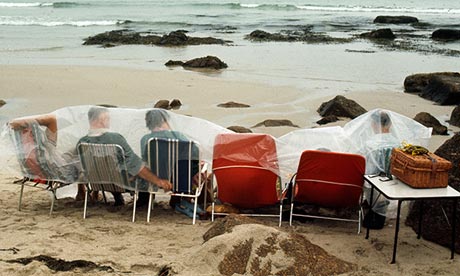 Holidaymakers on a beach in 1970