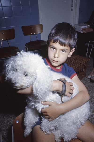 Vintage Blue Cross photos: Archive photo showing boy and dog in waiting room 