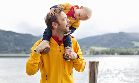 A child on her father's shoulders