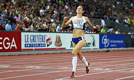 Jo Pavey crosses the line to win gold in the Women's 10,000 metres final 