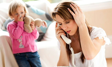 Stressed woman on phone  