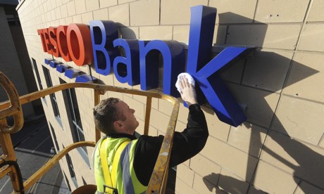 Tesco Bank sign being cleaned