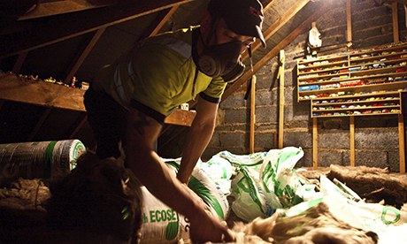 loft insulation being installed 