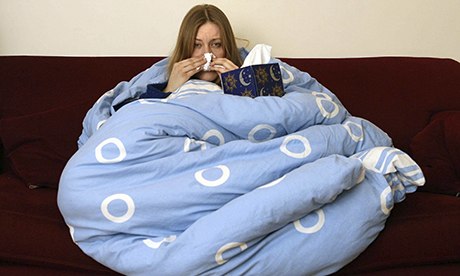 woman wrapped in duvet