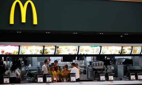 Staff gather in a McDonald's 