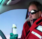 Jeremy Clarkson drinking a gin and tonic at the wheel in the Top Gear Polar Special