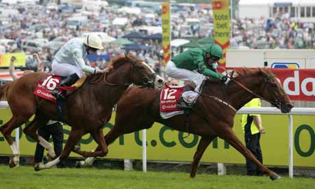Kevin Manning (green, right) rides New Approach to victory in the 2008 vodafone Derby ahead of Ryan Moore riding Tartan Bearer in second